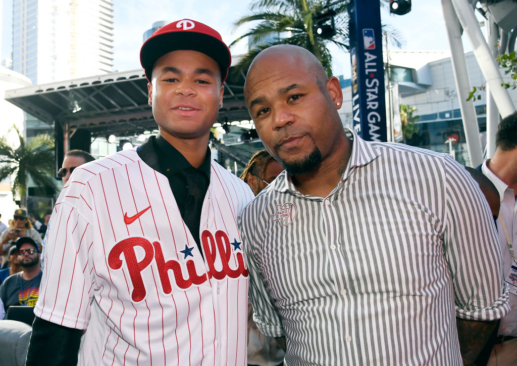 LOS ANGELES, CA - JULY 17: Justin Crawford poses with his Carl Crawford after he was picked 17th by the Philadelphia Phillies during the 2022 MLB Draft at XBOX Plaza on July 17, 2022 in Los Angeles, California.