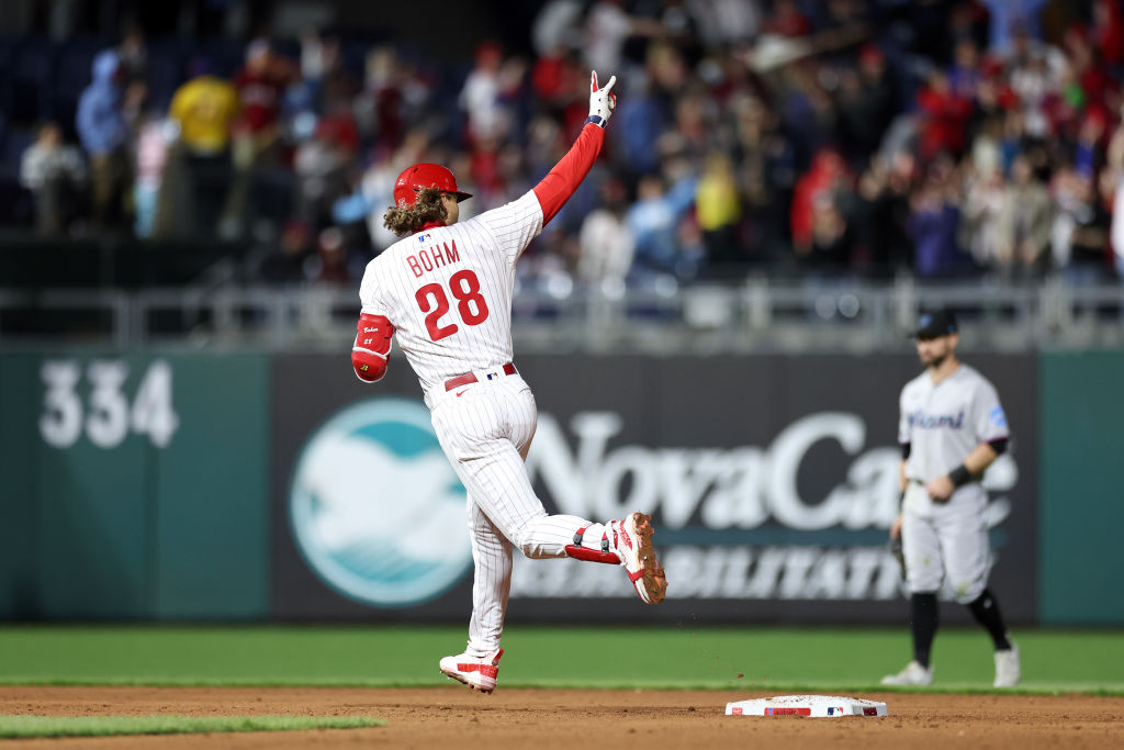 Alec Bohm #28 of the Philadelphia Phillies rounds bases and reacts after hitting a three run home run during the sixth inning against the Miami Marlins at Citizens Bank Park on April 10, 2023 in Philadelphia, Pennsylvania.