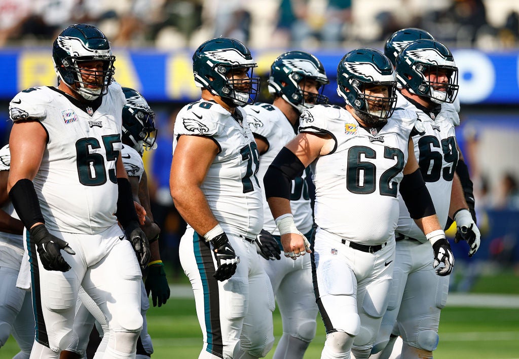 INGLEWOOD, CALIFORNIA - OCTOBER 08:   Lane Johnson #65, Jordan Mailata #68 and Jason Kelce #62 of the Philadelphia Eagles at SoFi Stadium on October 08, 2023 in Inglewood, California