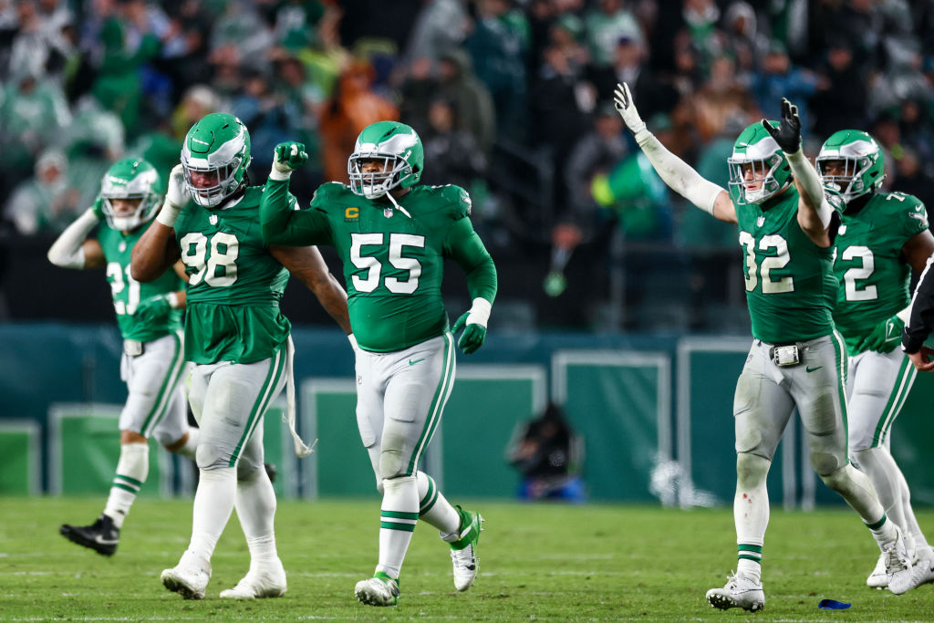 PHILADELPHIA, PENNSYLVANIA - NOVEMBER 26: Jalen Carter #98 of the Philadelphia Eagles, Brandon Graham #55 of the Philadelphia Eagles, and Reed Blankenship #32 of the Philadelphia Eagles react after a play during the third quarter against the Buffalo Bills at Lincoln Financial Field on November 26, 2023 in Philadelphia, Pennsylvania.