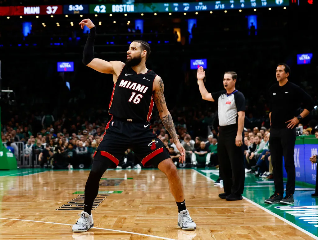 BOSTON, MA - APRIL 24: Caleb Martin #16 of the Miami Heat watches a three-point shot go in against the Boston Celtics during the second quarter of game two of the Eastern Conference First Round Playoffs at TD Garden on April 24, 2024 in Boston, Massachusetts. 