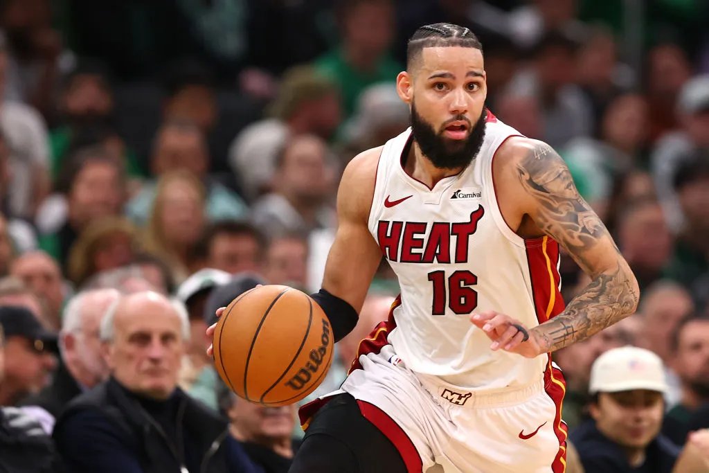 BOSTON, MASSACHUSETTS - MAY 01: Caleb Martin #16 of the Miami Heat dribbles against the Boston Celtics during the second quarter of game five of the Eastern Conference First Round Playoffs at TD Garden on May 01, 2024 in Boston, Massachusetts. 