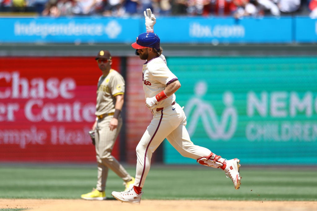 PHILADELPHIA, PENNSYLVANIA - JUNE 19: Bryce Harper #3 of the Philadelphia Phillies rounds bases after hitting a solo home run during the third inning against the San Diego Padres at Citizens Bank Park on June 19, 2024 in Philadelphia, Pennsylvania.