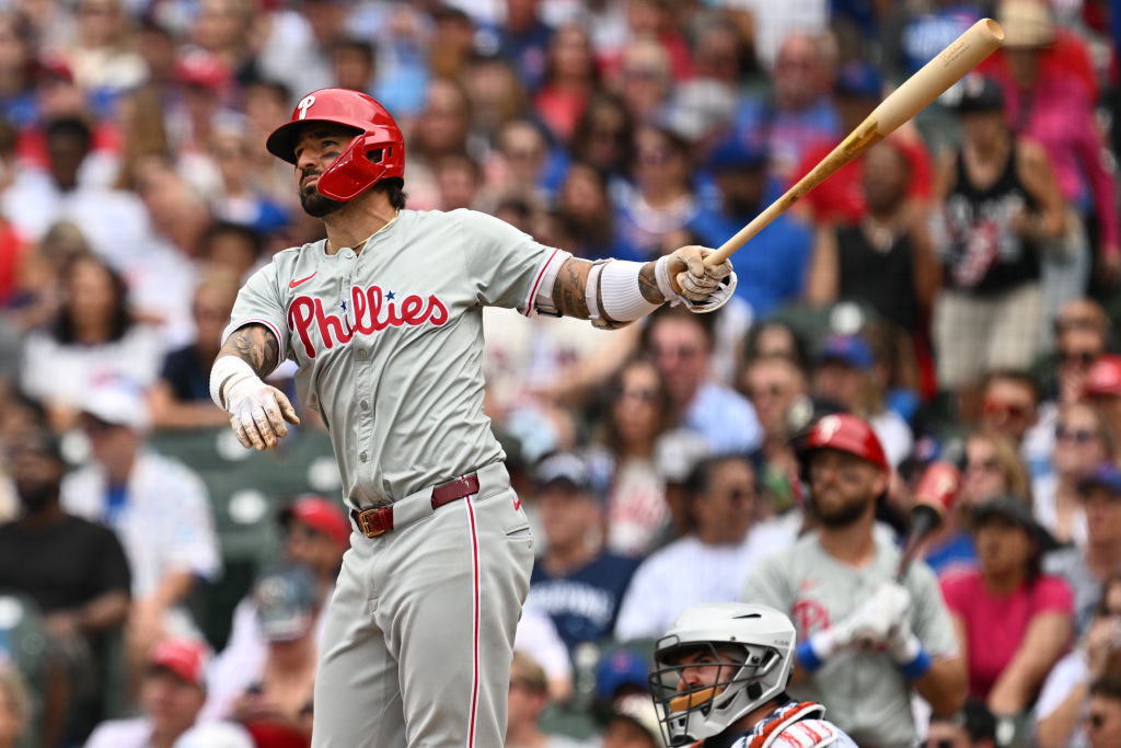 CHICAGO, IL - JULY 04:  Nick Castellanos #8 of the Philadelphia Phillies watches his home run in the fourth inning against the Chicago Cubs at Wrigley Field on July 04, 2024 in Chicago, Illinois. 