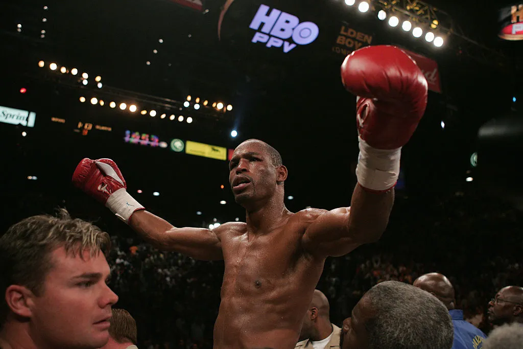 LAS VEGAS - SEPTEMBER18:  Bernard Hopkins celebrates after winning the match against Oscar De La Hoya for the world middleweight title at the MGM Grand Garden Arena on September 18, 2004 in Las Vegas, Nevada. Hopkins knocked out De La Hoya in the ninth round.