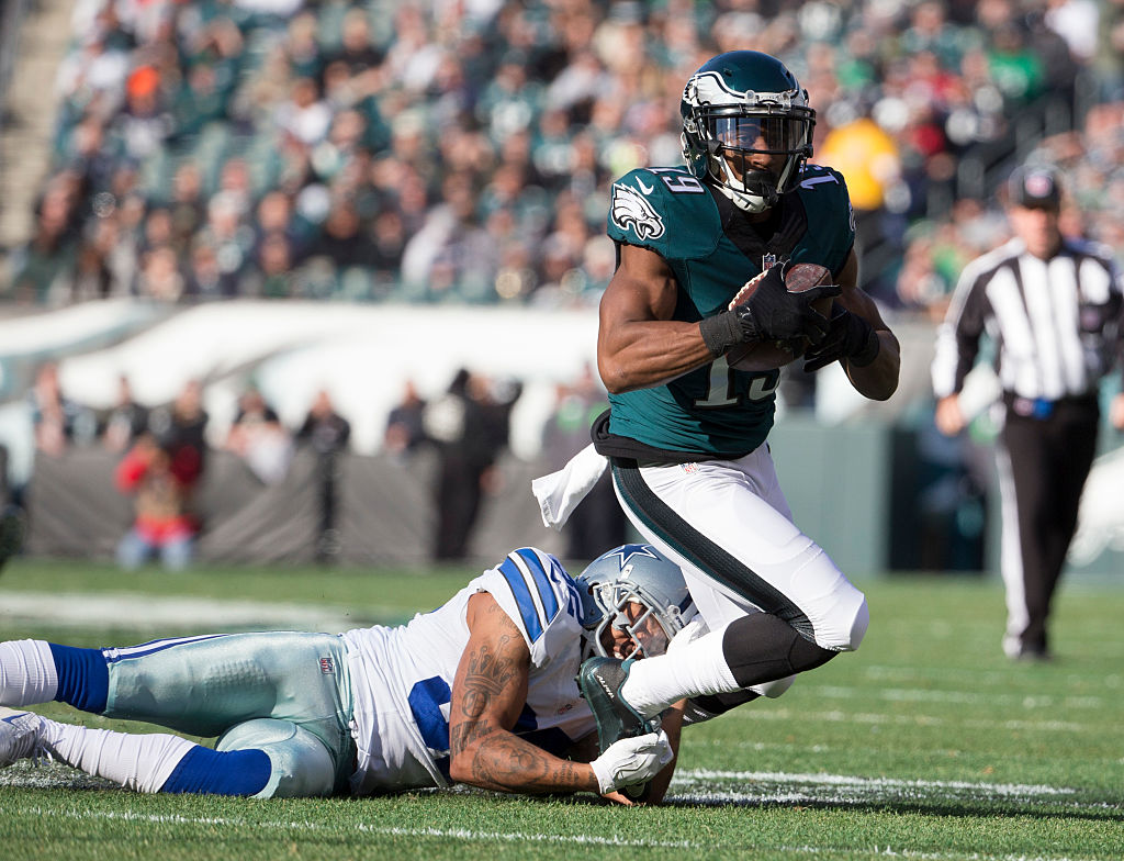 PHILADELPHIA, PA - JANUARY 1: Paul Turner #19 of the Philadelphia Eagles catches a pass and is tackled by Orlando Scandrick #32 of the Dallas Cowboys in the first quarter at Lincoln Financial Field on January 1, 2017 in Philadelphia, Pennsylvania. 