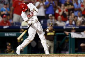 Nick Castellanos #8 of the Philadelphia Phillies hits a walk-off RBI double during the ninth inning to defeat the San Diego Padres at Citizens Bank Park on June 18, 2024 in Philadelphia, Pennsylvania.