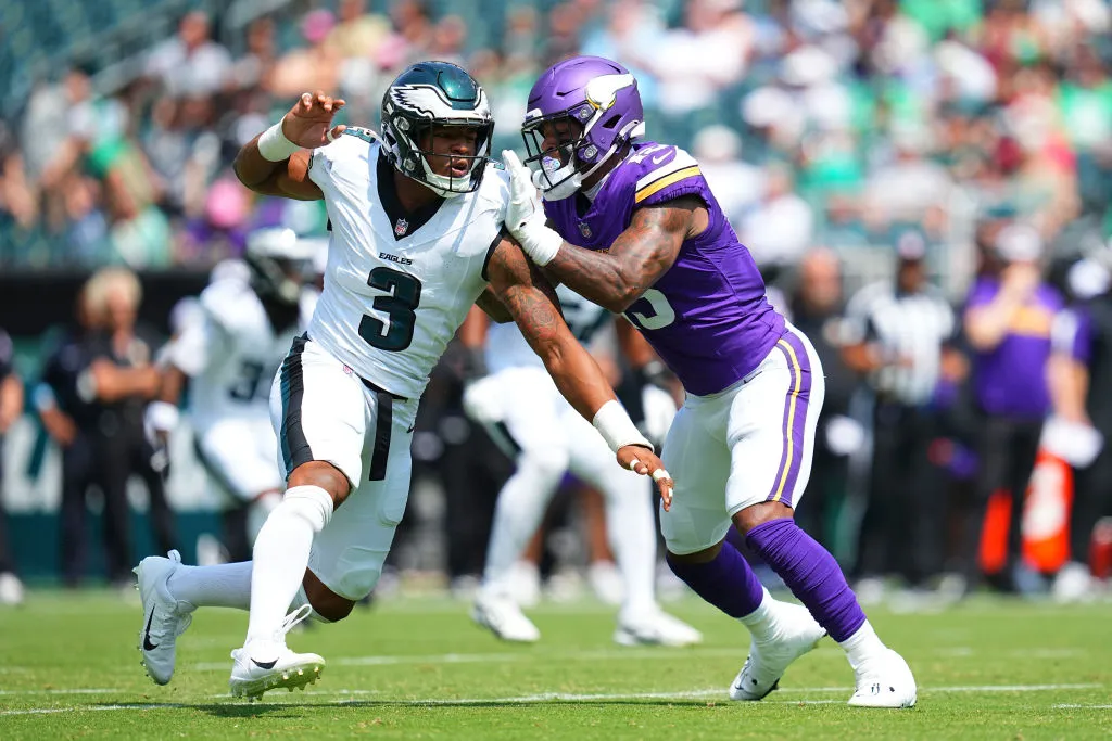 PHILADELPHIA, PENNSYLVANIA - AUGUST 24: Nolan Smith Jr. #3 of the Philadelphia Eagles rushes the passer against N'Keal Harry #13 of the Minnesota Vikings in the first half of the preseason game at Lincoln Financial Field on August 24, 2024 in Philadelphia, Pennsylvania.