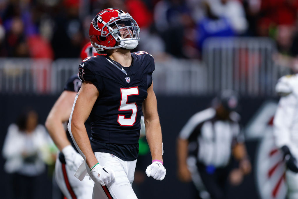 ATLANTA, GEORGIA - NOVEMBER 26: Drake London #5 of the Atlanta Falcons reacts after a touchdown score by Bijan Robinson #7 in the second quarter of the game against the New Orleans Saints at Mercedes-Benz Stadium on November 26, 2023 in Atlanta, Georgia. 