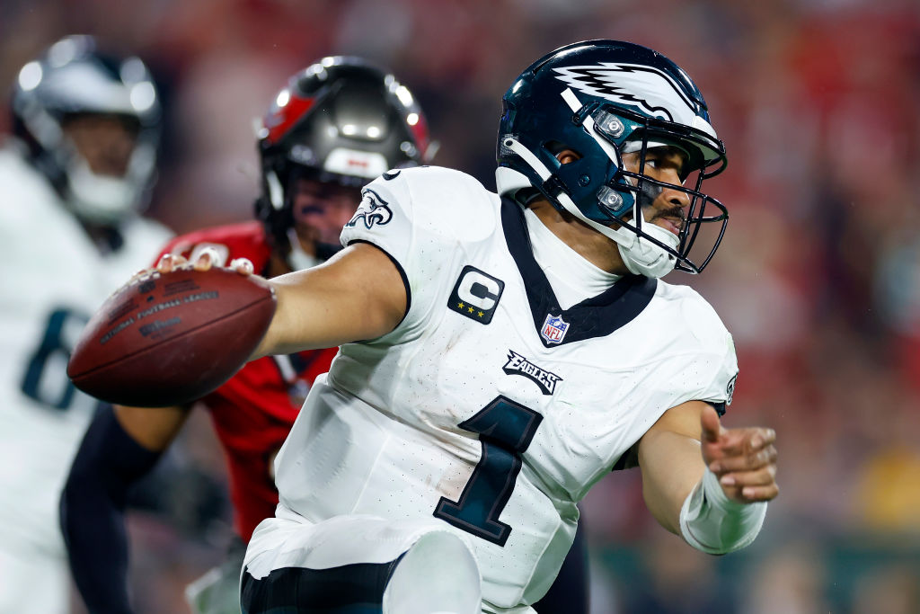 TAMPA, FLORIDA - JANUARY 15: Jalen Hurts #1 of the Philadelphia Eagles scrambles against the Tampa Bay Buccaneers during the second quarter in the NFC Wild Card Playoffs at Raymond James Stadium on January 15, 2024 in Tampa, Florida. 