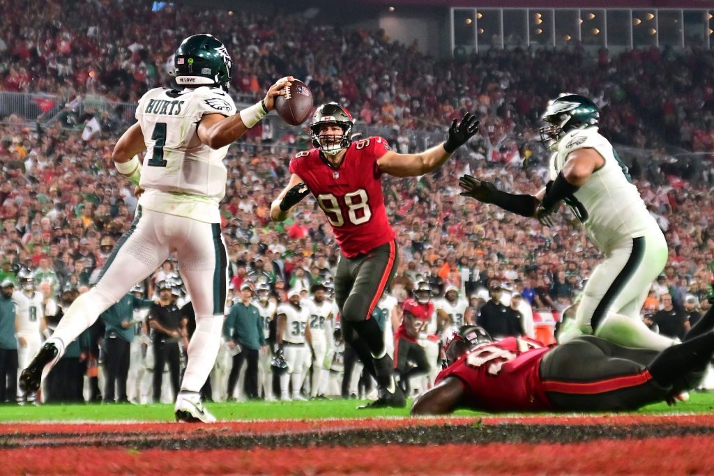 TAMPA, FLORIDA - JANUARY 15: Jalen Hurts #1 of the Philadelphia Eagles throws the ball for an intentional grounding that led to a safety against the Tampa Bay Buccaneers during the third quarter in the NFC Wild Card Playoffs at Raymond James Stadium on January 15, 2024 in Tampa, Florida.