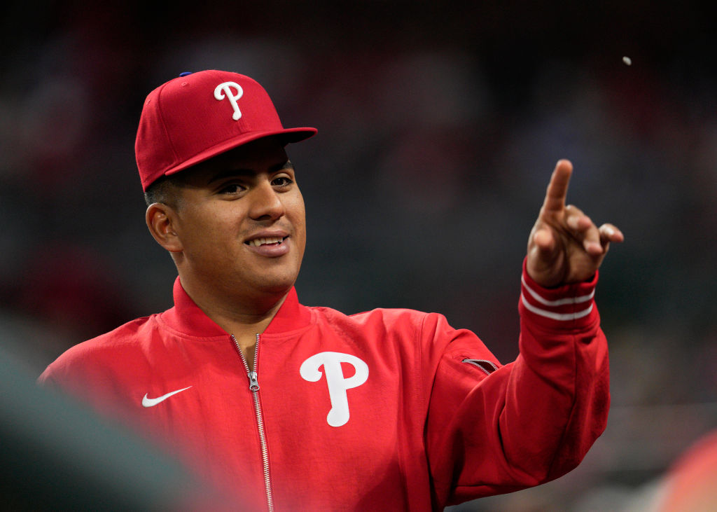 Ranger Suárez #55 of the Philadelphia Phillies throws a sunflower seed in the dugout during the fifth inning of a baseball game against the Cincinnati Reds at Great American Ball Park on April 23, 2024 in Cincinnati, Ohio.