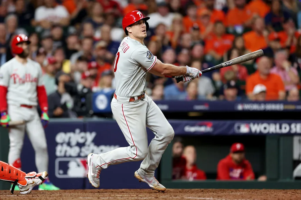 J.T. Realmuto #10 of the Philadelphia Phillies hits a home run in the 10th inning against the Houston Astros in Game One of the 2022 World Series at Minute Maid Park on October 28, 2022 in Houston, Texas.