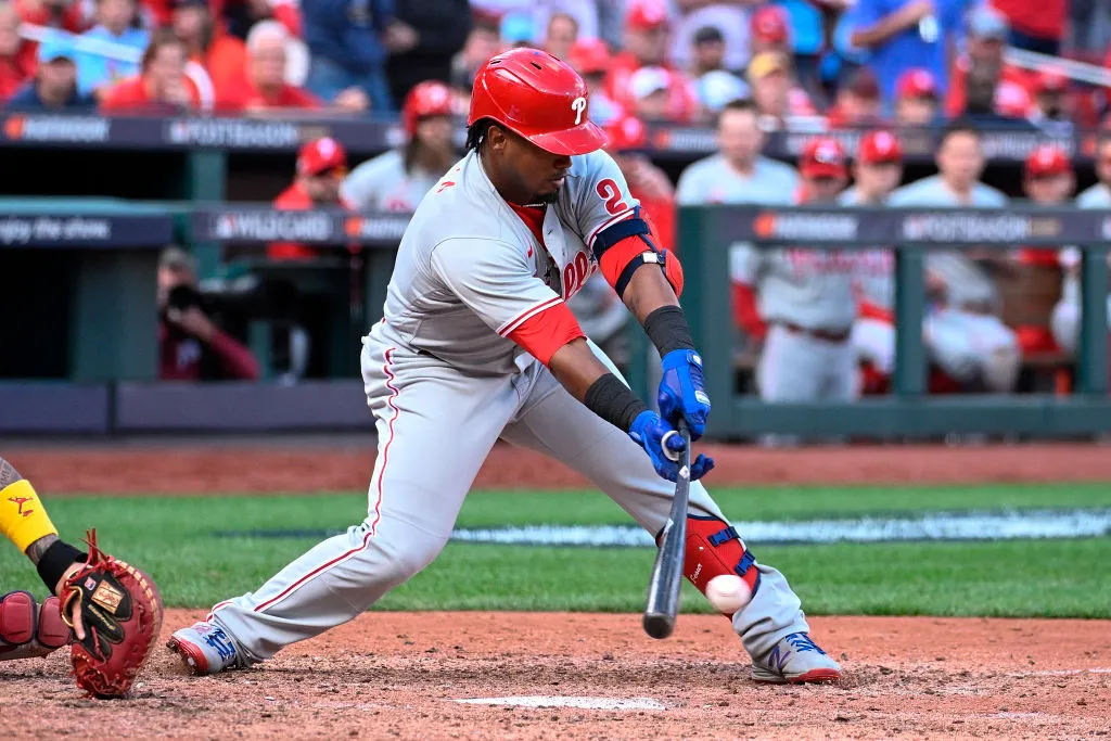 Jean Segura #2 of the Philadelphia Phillies hits a two-run single against the St. Louis Cardinals in the ninth inning during Game One of the NL Wild Card Series at Busch Stadium on October 7, 2022 in St Louis, Missouri.