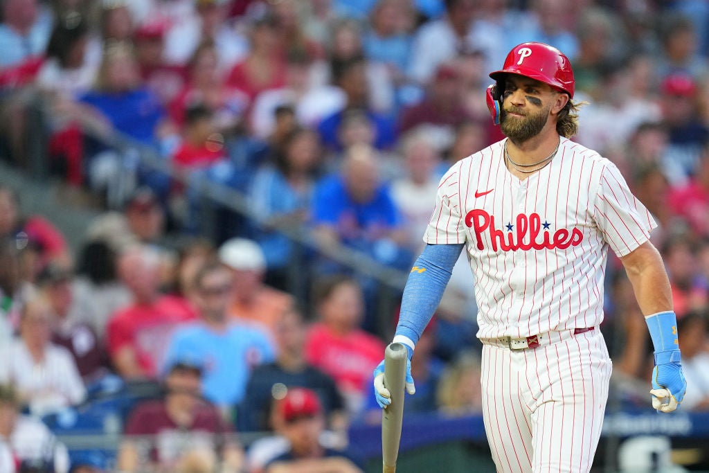 Bryce Harper #3 of the Philadelphia Phillies walks back to the dugout after striking out in the bottom of the fourth inning against the Miami Marlins at Citizens Bank Park on August 13, 2024 in Philadelphia, Pennsylvania. The Marlins defeated the Phillies 5-0.