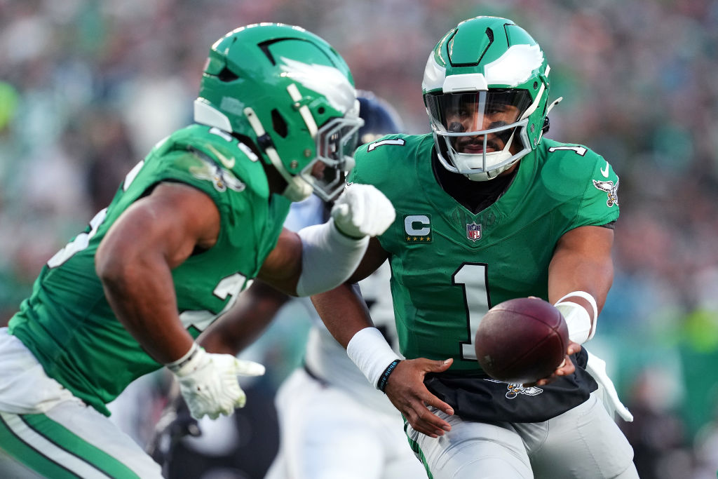 PHILADELPHIA, PENNSYLVANIA - NOVEMBER 03: Jalen Hurts #1 hands the ball off to Saquon Barkley #26 of the Philadelphia Eagles in the first quarter of a game against the Jacksonville Jaguars at Lincoln Financial Field on November 03, 2024 in Philadelphia, Pennsylvania. week 10 eagles power rankings