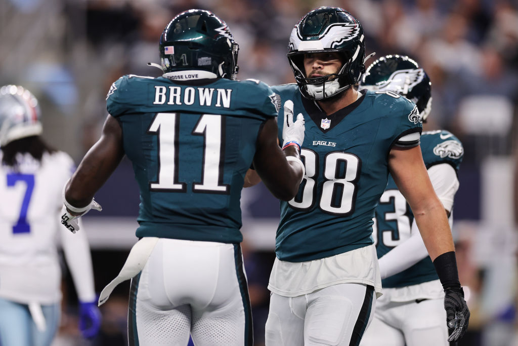 ARLINGTON, TEXAS - NOVEMBER 10: A.J. Brown #11 and Dallas Goedert #88 of the Philadelphia Eagles celebrate after a touchdown during the second quarter against the Dallas Cowboys at AT&T Stadium on November 10, 2024 in Arlington, Texas.