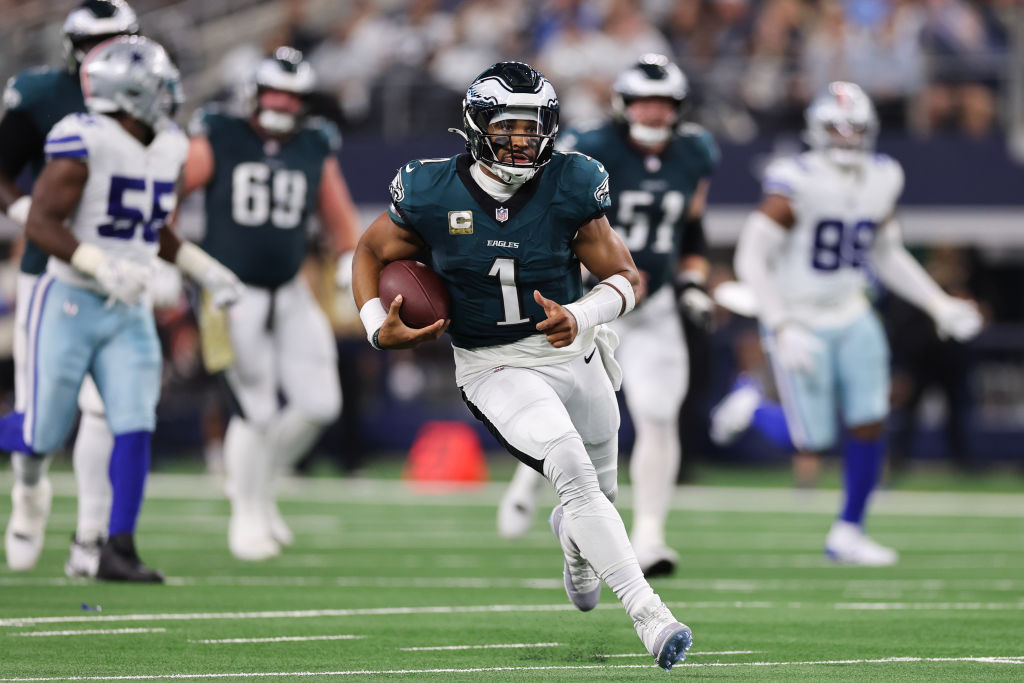 ARLINGTON, TEXAS - NOVEMBER 10: Jalen Hurts #1 of the Philadelphia Eagles runs with the ball during the second quarter against the Dallas Cowboys at AT&T Stadium on November 10, 2024 in Arlington, Texas.