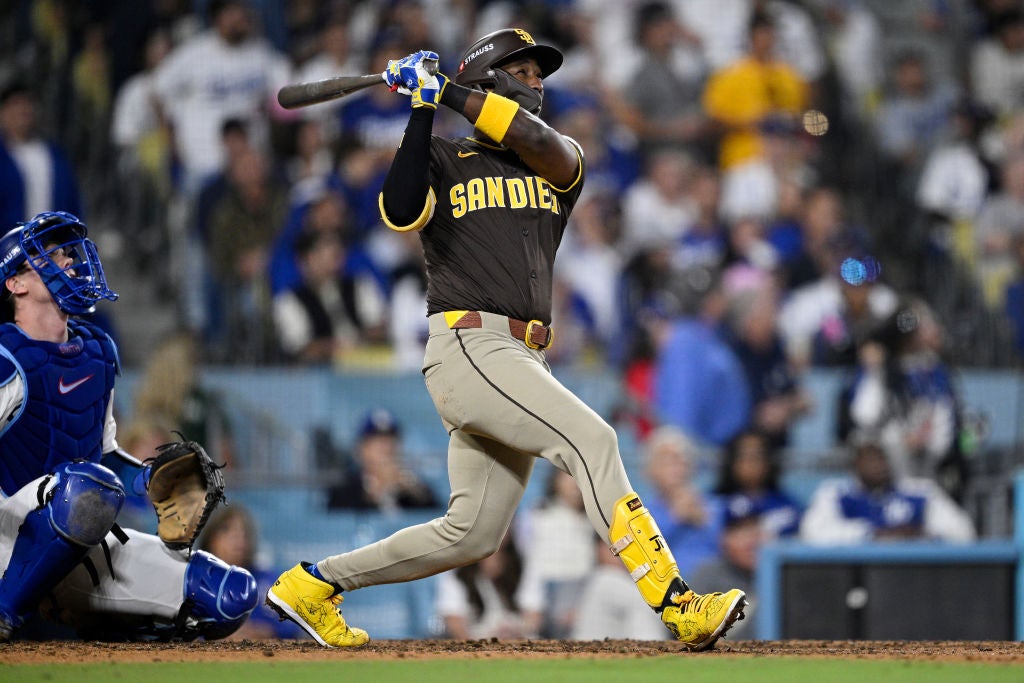 Jurickson Profar #10 of the San Diego Padres flies out in the eighth inning against the Los Angeles Dodgers during Game Two of the Division Series at Dodger Stadium on October 06, 2024 in Los Angeles, California.