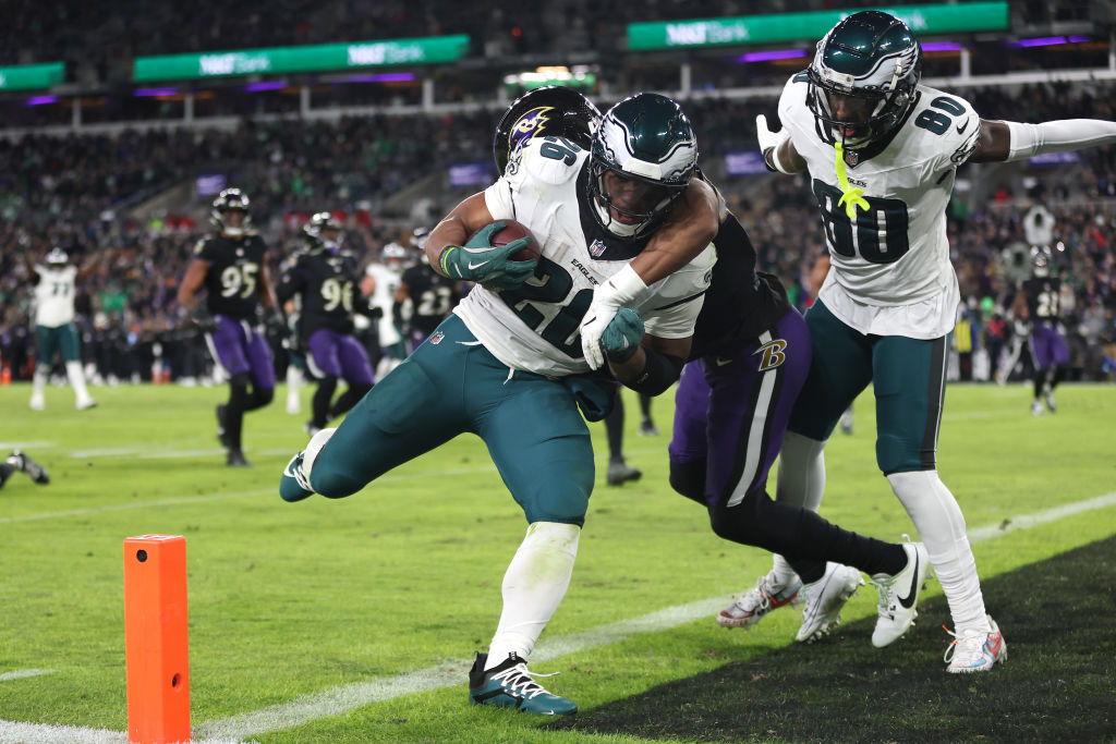 BALTIMORE, MARYLAND - DECEMBER 01: Saquon Barkley #26 of the Philadelphia Eagles runs the ball for a touchdown during the fourth quarter against the Baltimore Ravens at M&T Bank Stadium on December 01, 2024 in Baltimore, Maryland. Week 14 Eagles Power Rankings