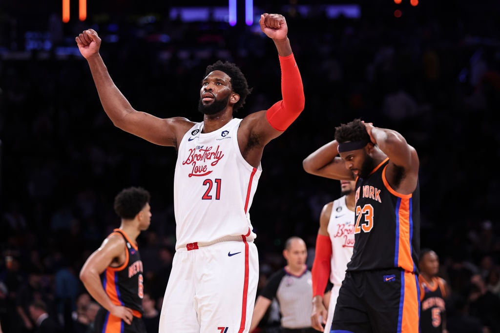 Joel Embiid #21 of the Philadelphia 76ers reacts during the fourth quarter of the game against the New York Knicks at Madison Square Garden on December 25, 2022 in New York City. NOTE TO USER: User expressly acknowledges and agrees that, by downloading and or using this photograph, User is consenting to the terms and conditions of the Getty Images License Agreement.