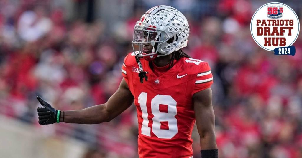 Nov 18, 2023; Columbus, Ohio, USA; Ohio State Buckeyes wide receiver Marvin Harrison Jr. (18) checks in as an eligible receiver during the NCAA football game against the Minnesota Golden Gophers at Ohio Stadium. (Adam Cairns/Columbus Dispatch/USA Today Network)